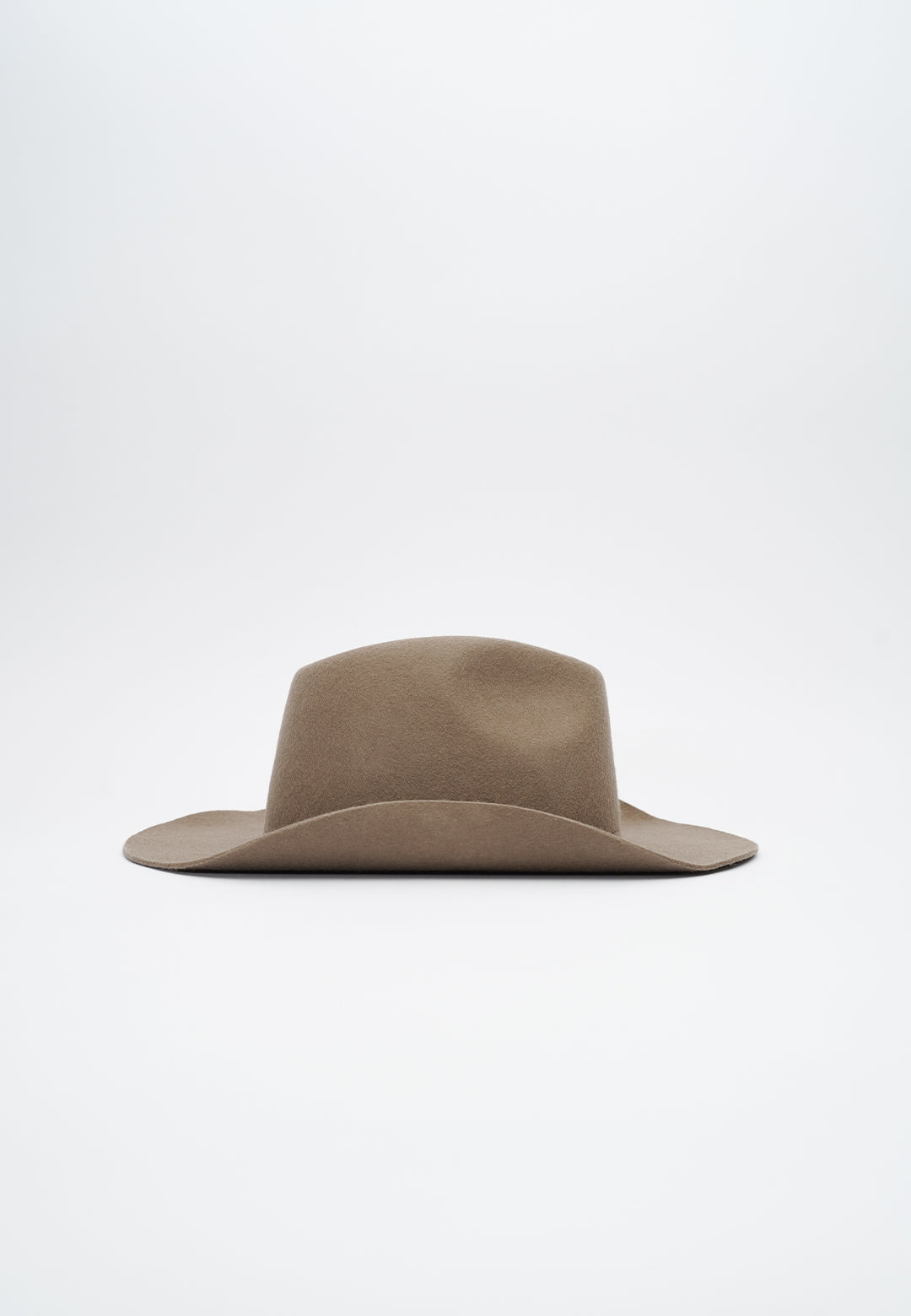 Handcrafted luxury felt hat in a classic cowboy style, made from premium materials. A perfect blend of elegance and Western charm, ideal for fashion-forward individuals and special occasions. N33 PURE CURVED. NTHIRTYTHREE