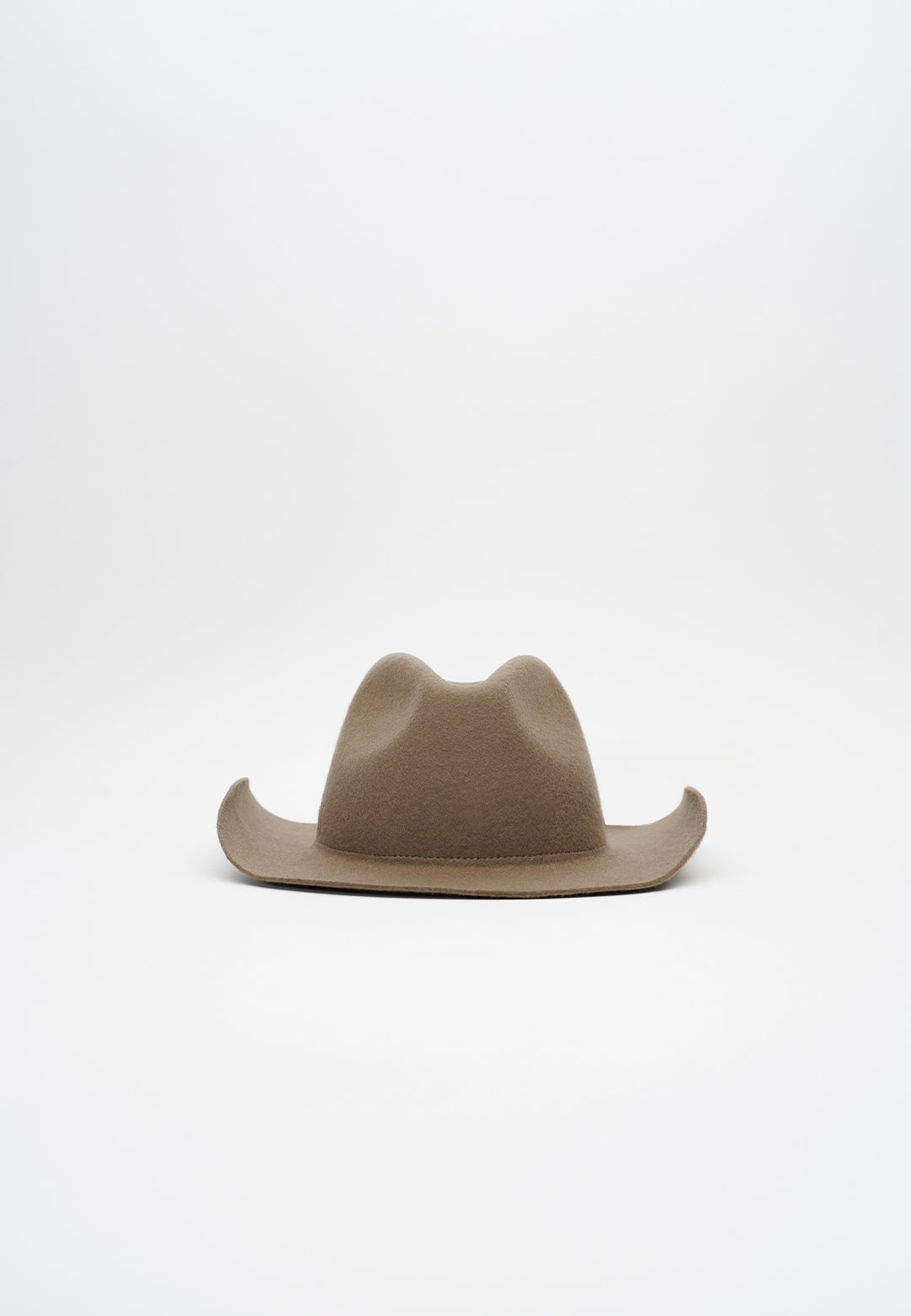 Handcrafted luxury felt hat in a classic cowboy style, made from premium materials. A perfect blend of elegance and Western charm, ideal for fashion-forward individuals and special occasions. N33 PURE CURVED. NTHIRTYTHREE